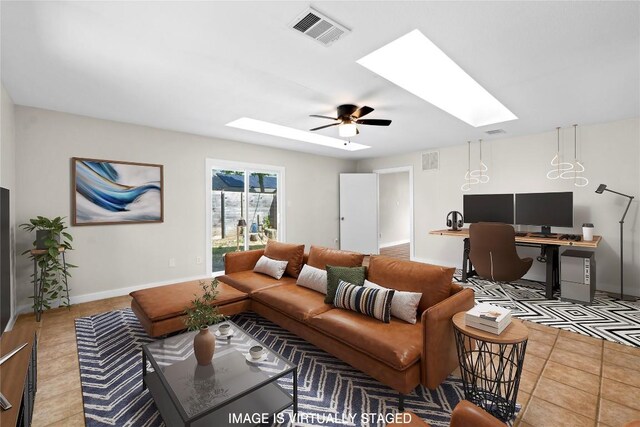 12922 Staton Dr, Austin, TX 78727 - tiled living room with a skylight, a ceiling fan, and an office area