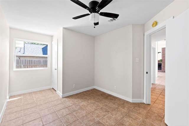 12922 Staton Dr, Austin, TX 78727 - spare room with a ceiling fan and light tile patterned flooring