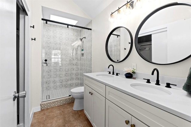 12922 Staton Dr, Austin, TX 78727 - full bath featuring a stall shower, double vanity, tile patterned flooring, and vaulted ceiling