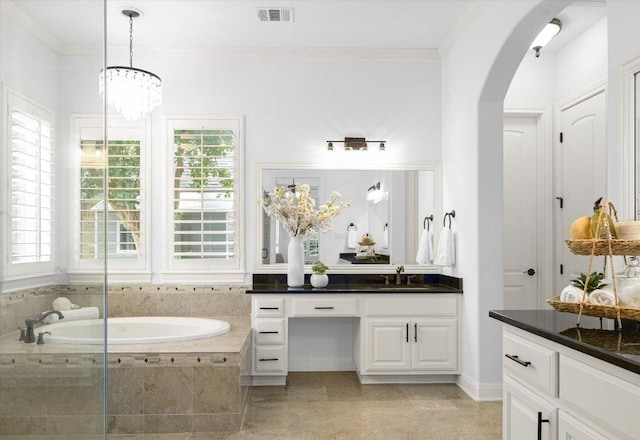 13212 Coleto Creek Trl, Austin, TX 78732 - bathroom featuring vanity, a bath, ornamental molding, tile patterned floors, and a chandelier