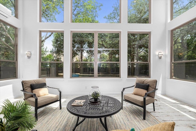 13212 Coleto Creek Trl, Austin, TX 78732 - sunroom with a towering ceiling, healthy amount of natural light, and an AC wall unit