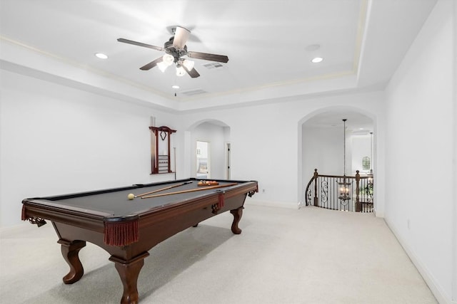 13212 Coleto Creek Trl, Austin, TX 78732 - game room with carpet floors, arched walkways, a tray ceiling, ceiling fan, and recessed lighting