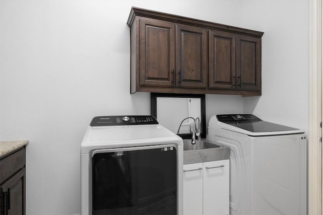 13212 Coleto Creek Trl, Austin, TX 78732 - laundry room with cabinet space and washing machine and dryer