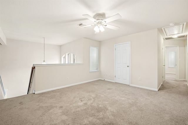 6710 Telluride Trl, Austin, TX 78749 - carpeted empty room featuring attic access and ceiling fan