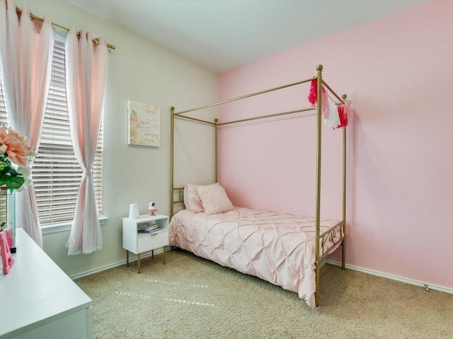 241 Sunnyside Dr, Kyle, TX 78640 - carpeted bedroom featuring baseboards