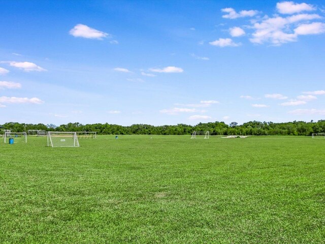 241 Sunnyside Dr, Kyle, TX 78640 - view of yard with an area for sports