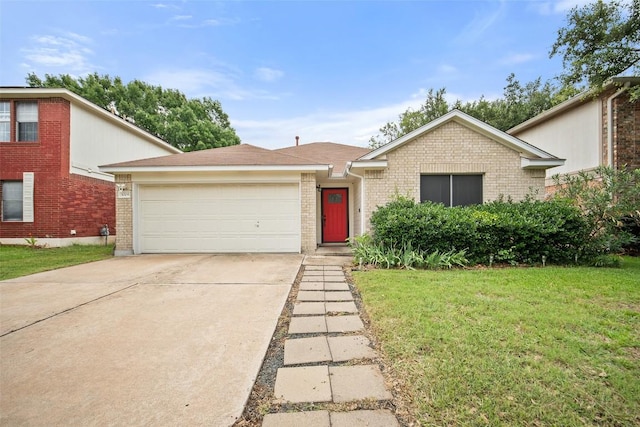 1009 Laurelleaf Dr, Pflugerville, TX 78660 - view of front of house with an attached garage, driveway, a front yard, and brick siding