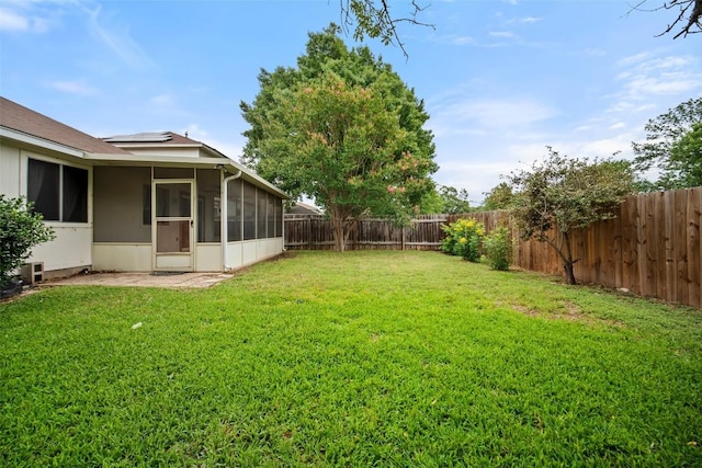 1009 Laurelleaf Dr, Pflugerville, TX 78660 - fenced backyard featuring a sunroom