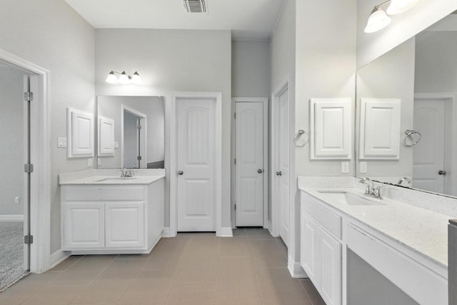 20024 Abigail Way, Pflugerville, TX 78660 - full bathroom featuring tile patterned floors and two vanities
