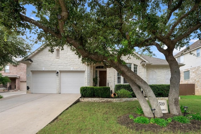 3509 Twin Branch Dr, Cedar Park, TX 78613 - view of front of house with stone siding, driveway, a garage, and a front yard