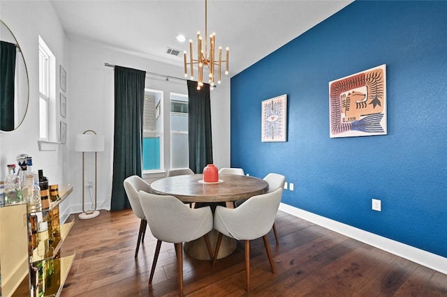 5904 Florencia Ln, Austin, TX 78724 - dining area featuring a chandelier and wood finished floors