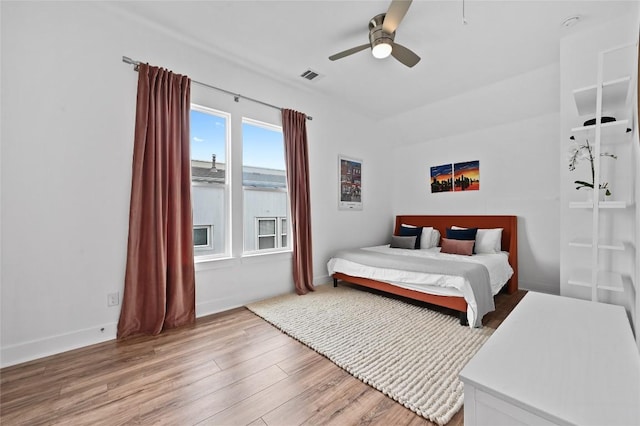 5904 Florencia Ln, Austin, TX 78724 - bedroom with light wood-style flooring and ceiling fan