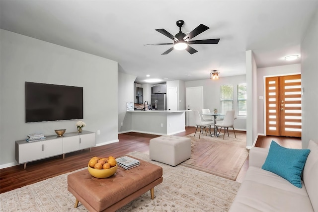 606 Elderberry Cv, Austin, TX 78745 - living area with wood finished floors and a ceiling fan