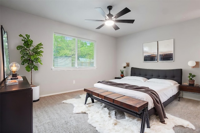 606 Elderberry Cv, Austin, TX 78745 - bedroom featuring light colored carpet and a ceiling fan