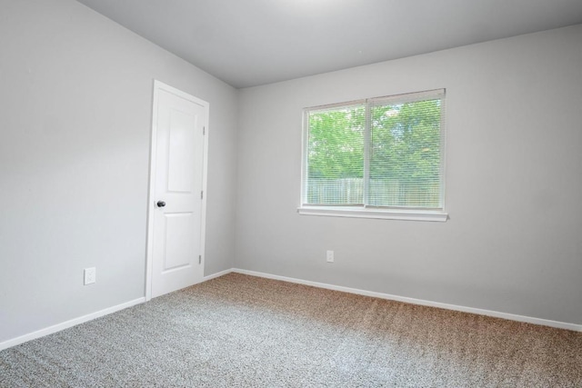 606 Elderberry Cv, Austin, TX 78745 - spare room with carpet floors and baseboards