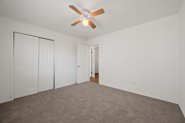 707 Eaglecreek Dr, Leander, TX 78641 - unfurnished bedroom featuring carpet floors, a closet, and a ceiling fan