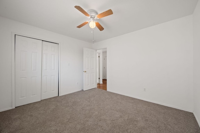 707 Eaglecreek Dr, Leander, TX 78641 - unfurnished bedroom featuring carpet flooring, a closet, and a ceiling fan