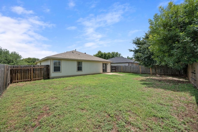 707 Eaglecreek Dr, Leander, TX 78641 - rear view of property with a fenced backyard
