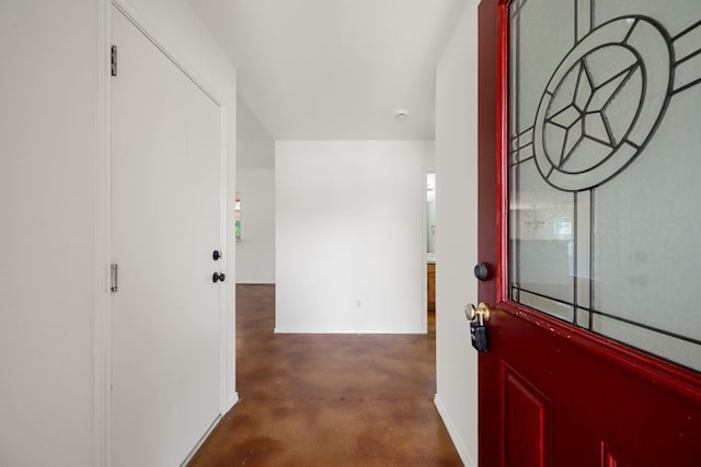 707 Eaglecreek Dr, Leander, TX 78641 - foyer with finished concrete floors and baseboards