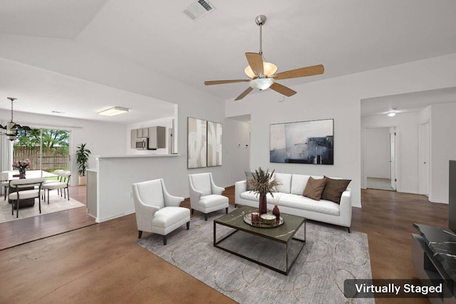 707 Eaglecreek Dr, Leander, TX 78641 - living area with finished concrete flooring and ceiling fan