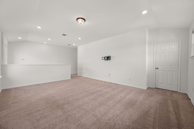 716 Madalin Rue Ct, Leander, TX 78641 - spare room featuring vaulted ceiling, recessed lighting, and light colored carpet