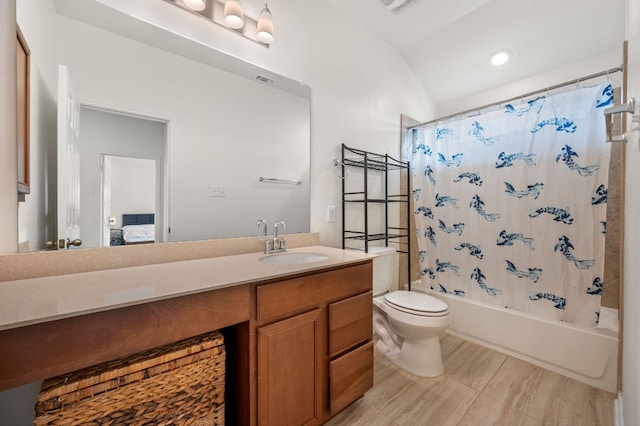 716 Madalin Rue Ct, Leander, TX 78641 - ensuite bathroom featuring vanity, shower / tub combo with curtain, and lofted ceiling