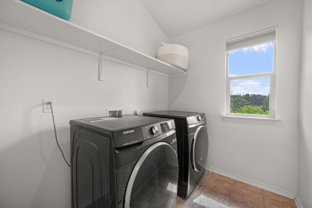 716 Madalin Rue Ct, Leander, TX 78641 - washroom with washer and dryer and baseboards