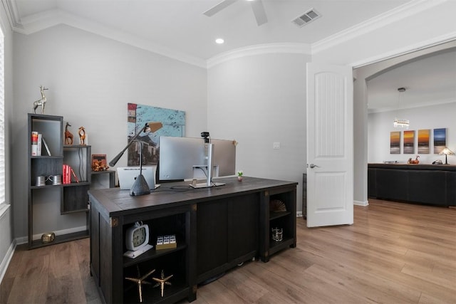 2105 Peoria Dr, Leander, TX 78641 - office space featuring a ceiling fan, wood finished floors, crown molding, arched walkways, and recessed lighting