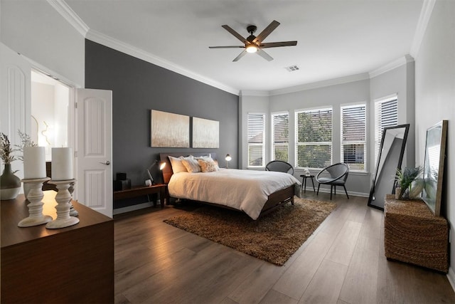 2105 Peoria Dr, Leander, TX 78641 - bedroom with crown molding, wood finished floors, and a ceiling fan