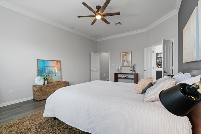 2105 Peoria Dr, Leander, TX 78641 - bedroom with wood finished floors, ornamental molding, and a ceiling fan