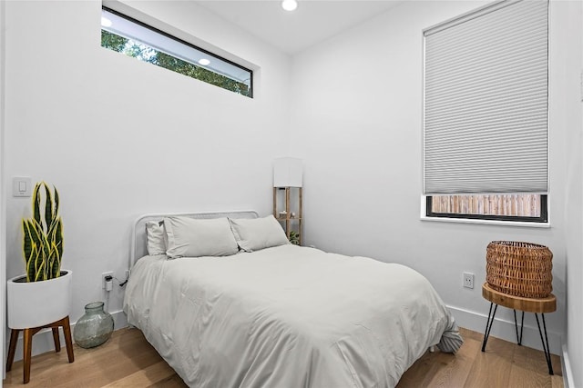 2216 Lindell Ave Unit 2, Austin, TX 78704 - bedroom with wood finished floors and recessed lighting