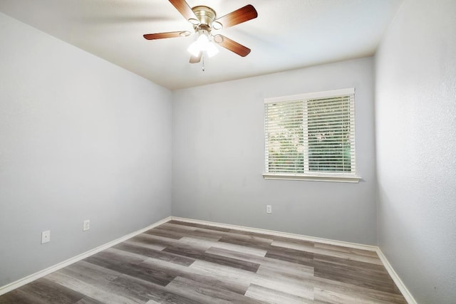 371 Bloomsbury Dr, Kyle, TX 78640 - unfurnished room featuring wood finished floors and ceiling fan