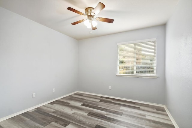 371 Bloomsbury Dr, Kyle, TX 78640 - empty room featuring wood finished floors and ceiling fan