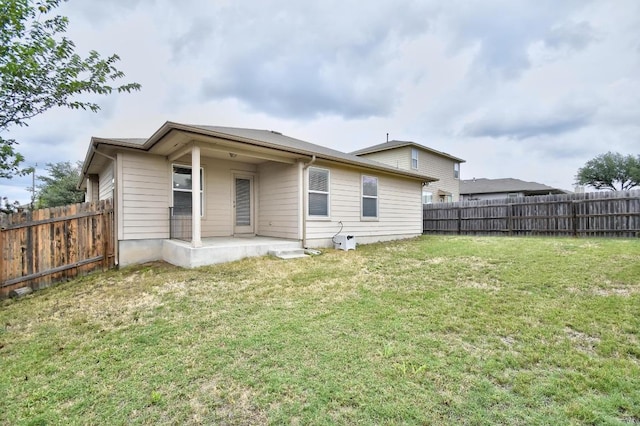 371 Bloomsbury Dr, Kyle, TX 78640 - rear view of property with a fenced backyard and a patio