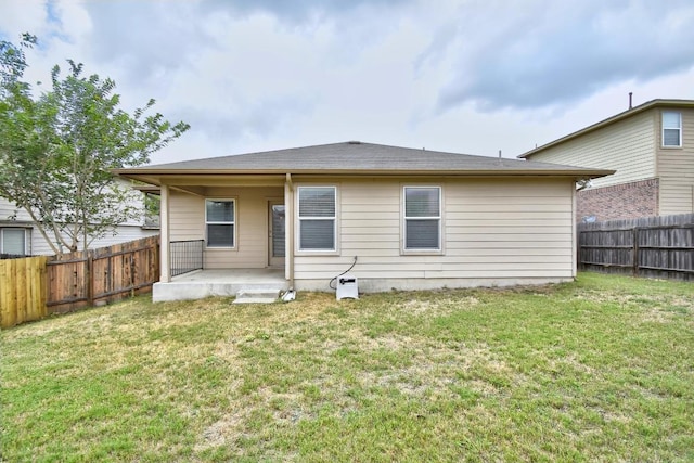 371 Bloomsbury Dr, Kyle, TX 78640 - rear view of property featuring a fenced backyard and a patio