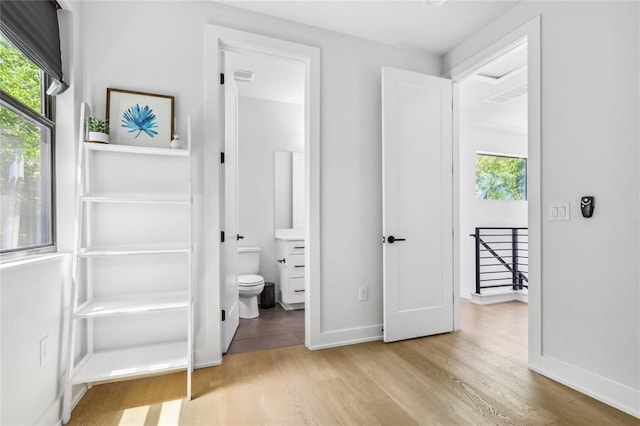619 Hammack Dr Unit 2, Austin, TX 78752 - unfurnished bedroom with wood finished floors and ensuite bathroom