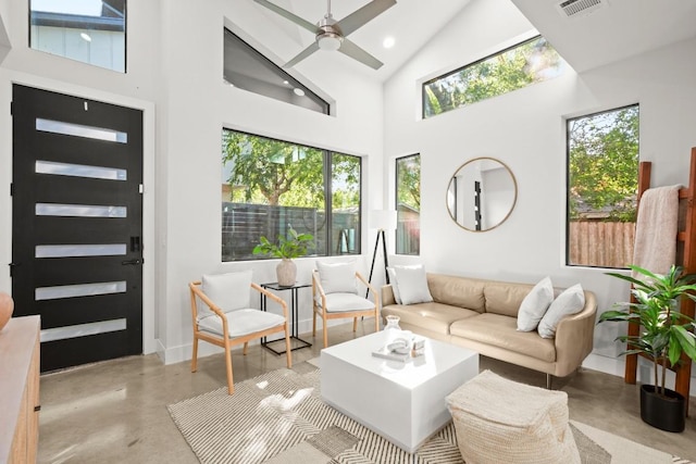 619 Hammack Dr Unit 2, Austin, TX 78752 - living room featuring concrete flooring, high vaulted ceiling, ceiling fan, plenty of natural light, and recessed lighting