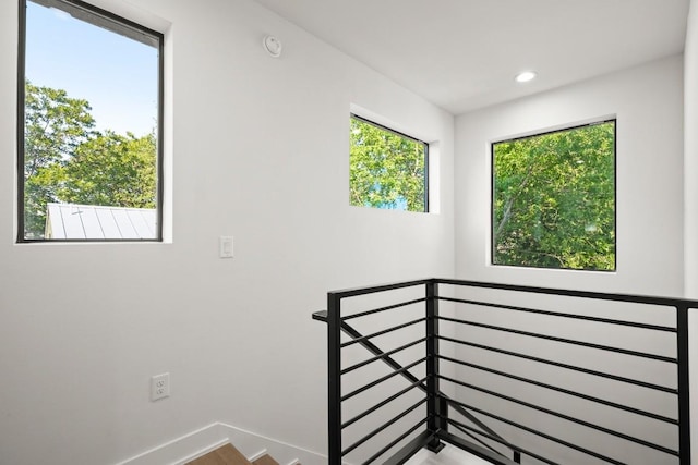 619 Hammack Dr Unit 2, Austin, TX 78752 - staircase with baseboards and recessed lighting