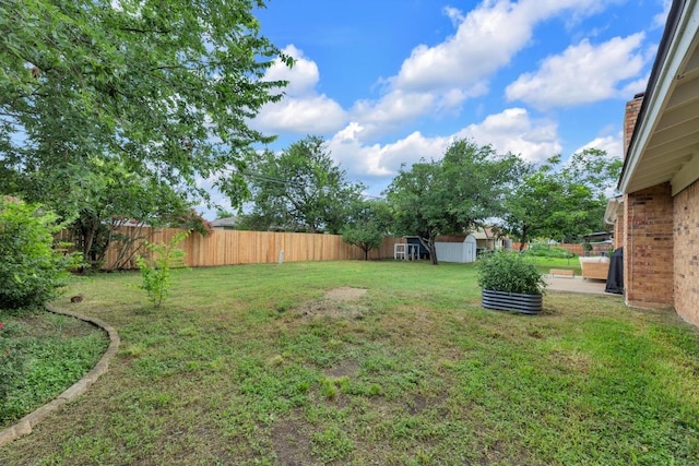 409 White Wing Way, Round Rock, TX 78664 - fenced backyard with a storage unit and a patio area