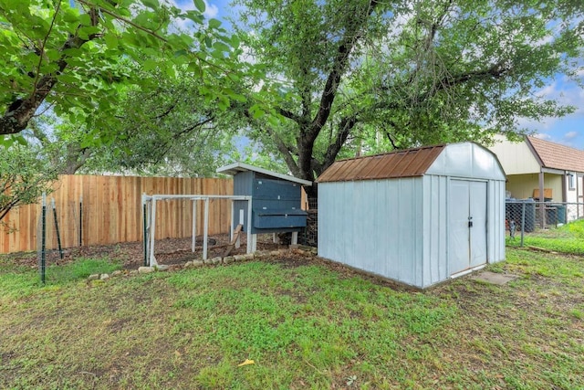 409 White Wing Way, Round Rock, TX 78664 - fenced backyard with a shed