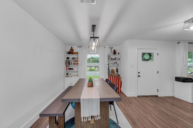 409 White Wing Way, Round Rock, TX 78664 - dining space with wood finished floors and baseboards