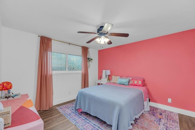 409 White Wing Way, Round Rock, TX 78664 - bedroom featuring wood finished floors and a ceiling fan