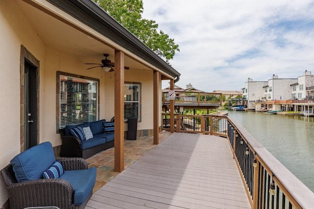 521 Lucy Ln, Horseshoe Bay, TX 78657 - wooden terrace with a water view, ceiling fan, outdoor lounge area, and a residential view