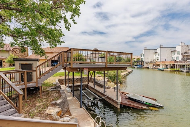 521 Lucy Ln, Horseshoe Bay, TX 78657 - dock area featuring stairs, a deck with water view, boat lift, and a residential view