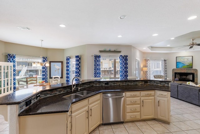 521 Lucy Ln, Horseshoe Bay, TX 78657 - kitchen with dishwasher, open floor plan, ceiling fan, light tile patterned flooring, and recessed lighting