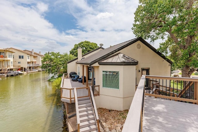521 Lucy Ln, Horseshoe Bay, TX 78657 - dock area featuring a deck with water view and stairway
