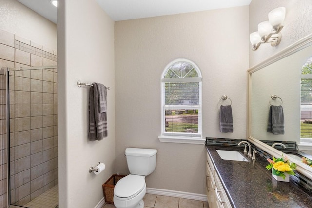 521 Lucy Ln, Horseshoe Bay, TX 78657 - full bathroom featuring vanity, a stall shower, and tile patterned flooring