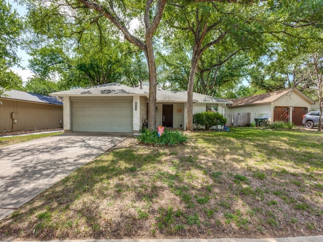 11405 Bristle Oak Trl, Austin, TX 78750 - ranch-style house with a garage, driveway, and a front yard