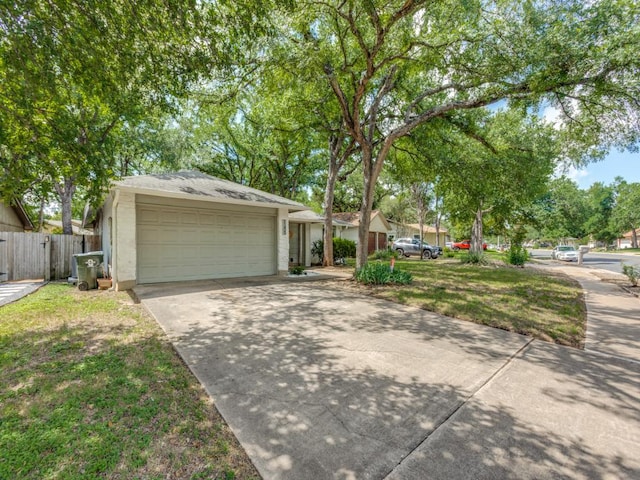 11405 Bristle Oak Trl, Austin, TX 78750 - view of front of property with concrete driveway and an attached garage