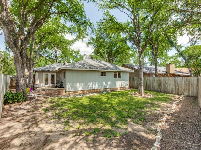 11405 Bristle Oak Trl, Austin, TX 78750 - back of house featuring french doors, a fenced backyard, and a patio